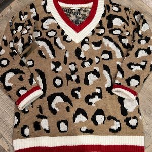 CHEETAH 🐆 print sweater with red and black detail.
